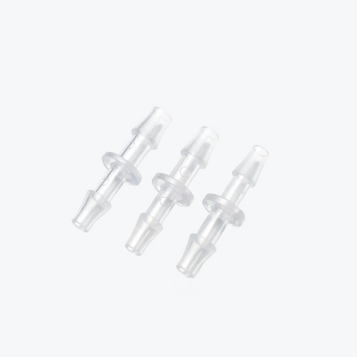 Three clear plastic connectors on a white background